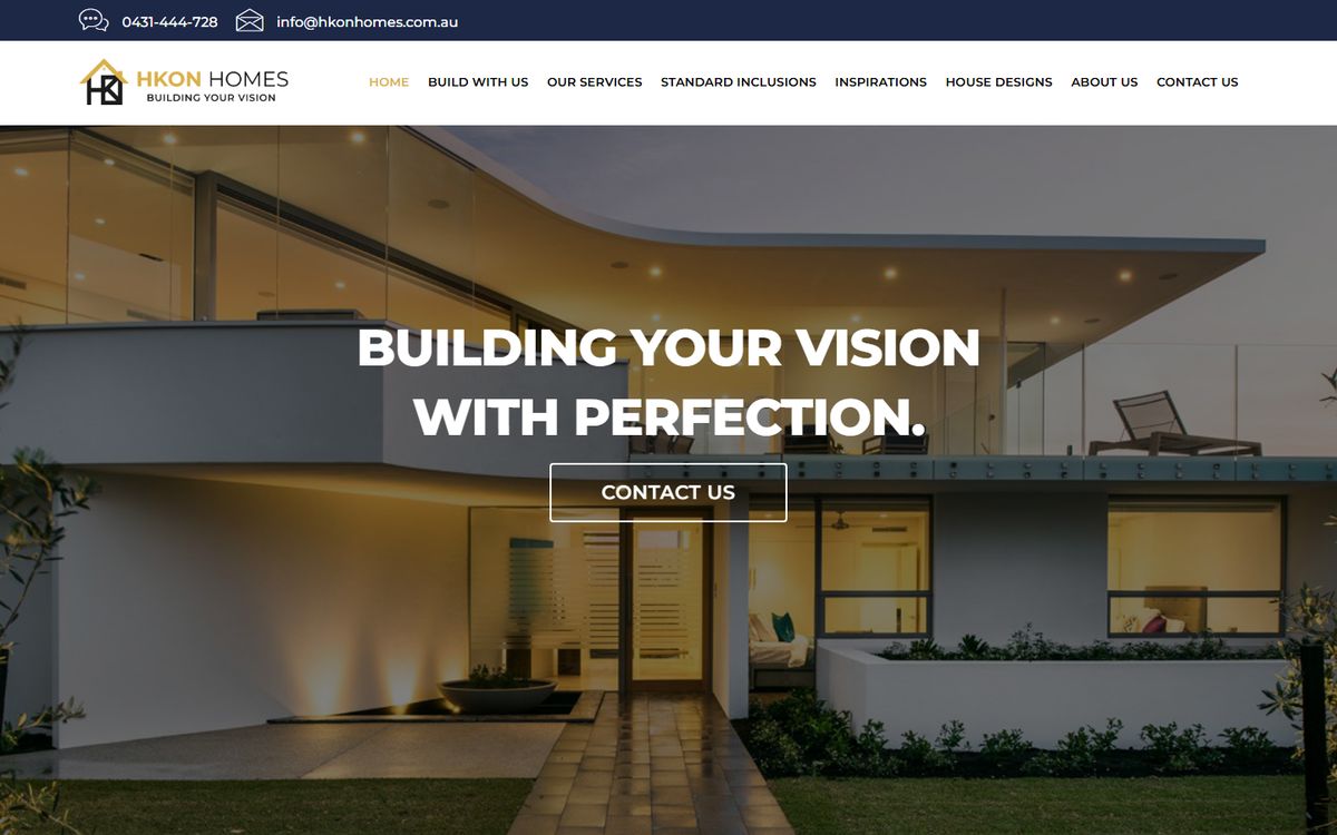 The HKON Homes website: a modern home at dusk under the line Building your vision with perfection.
